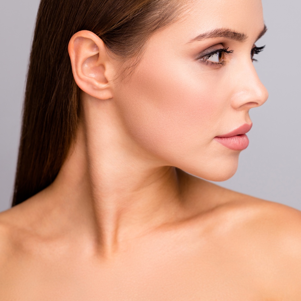 Closeup profile photo of attractive beautiful lady nude shoulders plump perfect shape lips ideal tempting appearance look side empty space isolated grey color background