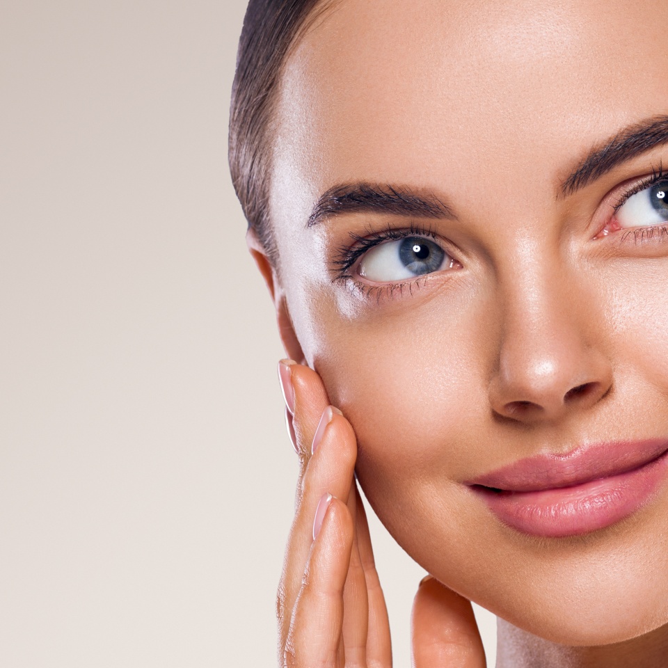 Woman face beautiul eyes nose clean tanned skin cute happy smile beauty female