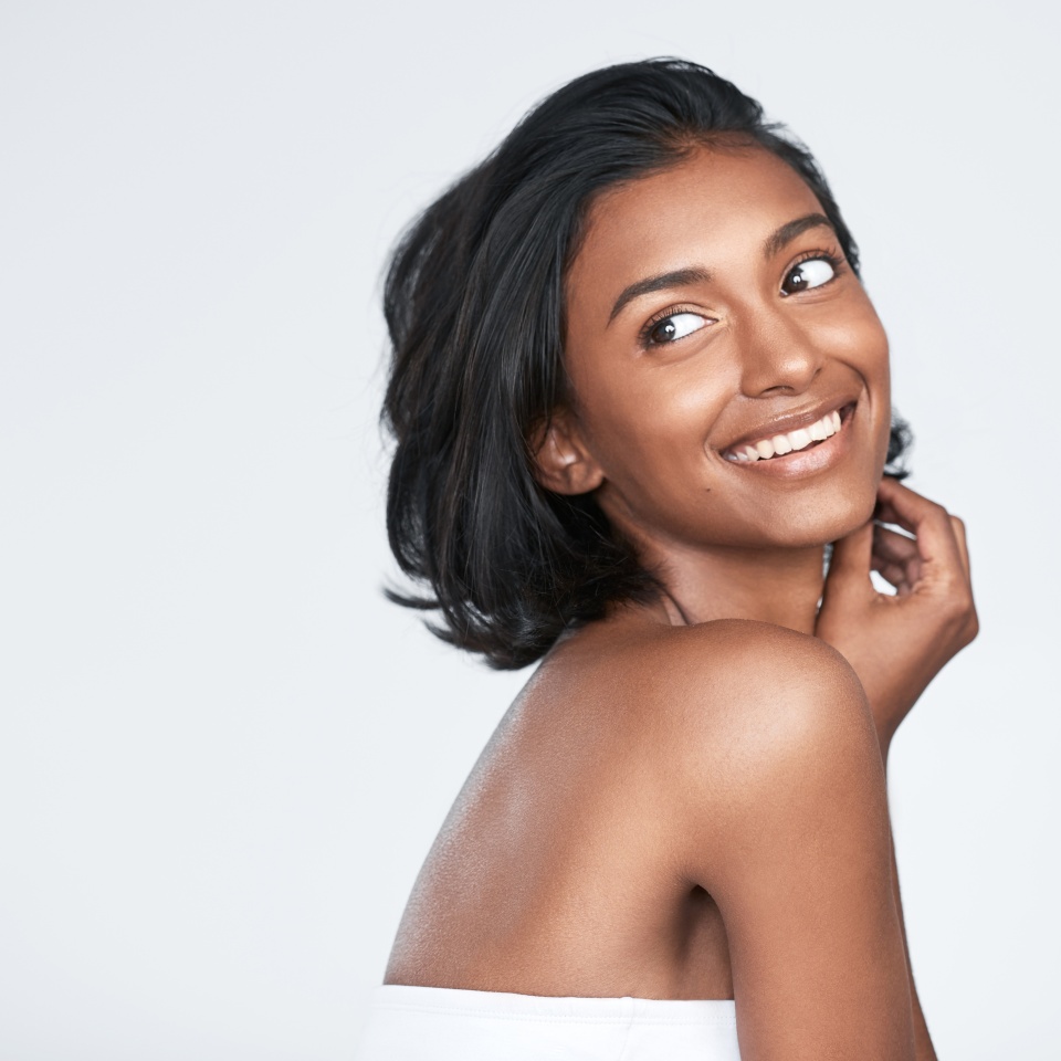 W e all want to look our best with minimal effort. Shot of a beautiful young woman posing against a white background.