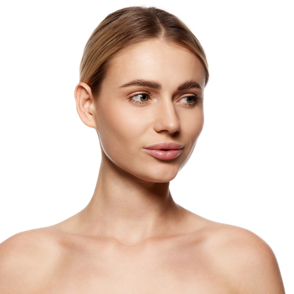 Pursuit of natural, radiant beauty. Beautiful young woman with clear face, small nose and plump lips isolated on white background. Concept of beauty, plastic surgery, face lifting, face building