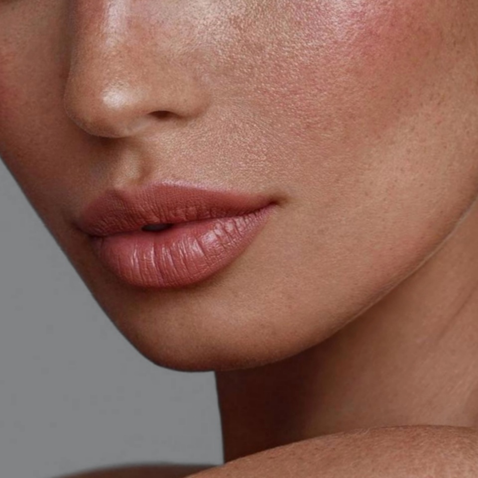 Portrait of a beautiful young woman with makeup, fresh and smooth skin, light freckles, red lipstick and soft hair _ Beautiful woman with makeup