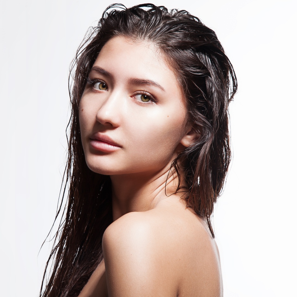 Girl without a make-up with a clear perfect skin and beautiful eyes