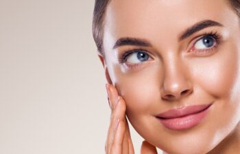 Woman face beautiul eyes nose clean tanned skin cute happy smile beauty female