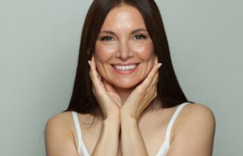 Perfect 50s middle aged mature woman looking at camera, fashion beauty portrait. Healthcare, skincare, beauty, middle age and cosmetology concept