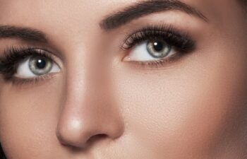 Close-Up of a woman's eyes after eyelash extension and eyebrow correction.