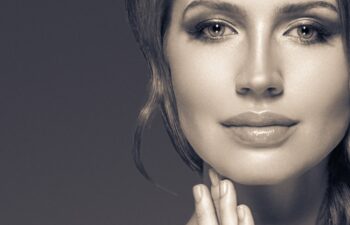 Woman monochrome portrait with beautiful hair and beauty skin. Black and white. Studio shot.